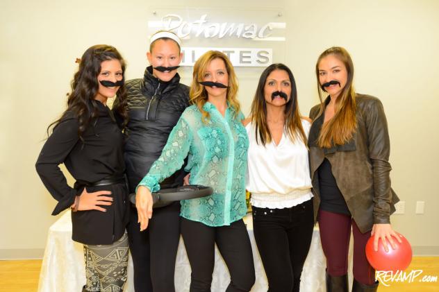 The Potomac Pilates team in full 'stache regalia.